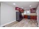 Compact kitchen with ample cabinet space, and black appliances at 636 Forest Nw St, Concord, NC 28025