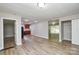 Open floor plan showcasing seamless flow from living area to kitchen with modern appliances and ample storage at 636 Forest Nw St, Concord, NC 28025