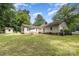 View of the home's backyard from the right side at 713 Hickory Hill Ct, Gastonia, NC 28054