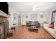 A well-decorated living room with hardwood floors and stylish furniture arrangement at 713 Hickory Hill Ct, Gastonia, NC 28054