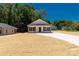 Charming single-story home featuring a modern exterior, front porch and a new lawn at 812 Generation Ln, Clover, SC 29710