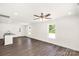 Bright, open-concept living space with wood floors, recessed lighting, and natural light at 812 Generation Ln, Clover, SC 29710