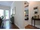 Hallway with hardwood floors, leading to a bedroom with exposed beams at 914 Greenbridge Dr, Matthews, NC 28105