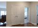 Hallway with a double door closet with view to the bedroom in the background at 914 Greenbridge Dr, Matthews, NC 28105