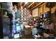Functional storage room with shelves, clear bins, and wooden support beams at 914 Greenbridge Dr, Matthews, NC 28105