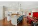 Modern kitchen with granite countertops, stainless steel appliances, and a breakfast bar for casual dining at 9330 Carneros Creek Rd, Charlotte, NC 28214