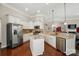 Bright kitchen with stainless steel appliances, granite countertops, and a center island at 9330 Carneros Creek Rd, Charlotte, NC 28214