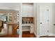 Kitchen nook with built-in cabinets, granite countertops, and hardwood floors at 9330 Carneros Creek Rd, Charlotte, NC 28214