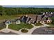 An aerial view of a lovely clubhouse, tennis court and gazebo in a beautiful setting at 9662 Liberty Hill Dr, Mint Hill, NC 28227