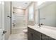 Bright bathroom featuring double vanity, soaking tub, and modern fixtures at 9662 Liberty Hill Dr, Mint Hill, NC 28227