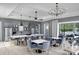 A spacious kitchen and dining area with lots of natural light and stainless steel appliances at 9662 Liberty Hill Dr, Mint Hill, NC 28227