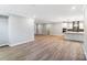 Open living space with wood flooring, showcasing the layout and design elements of the home at 9662 Liberty Hill Dr, Mint Hill, NC 28227