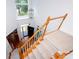 Open foyer features a staircase with carpeted treads and a wooden railing at 10408 Hadleigh Pl, Charlotte, NC 28210