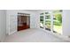 Open floor plan room with plenty of natural light and exterior views at 10408 Hadleigh Pl, Charlotte, NC 28210