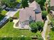 Aerial view of a beautiful home featuring a pergola and brick perimeter at 10418 Pullengreen Dr, Charlotte, NC 28277