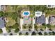 Expansive aerial view showcasing the property's layout, pool, lush landscaping, and neighborhood setting at 11335 Wescott Hill Dr, Huntersville, NC 28078
