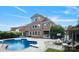 Beautiful backyard featuring a pool, patio, and fire pit, ideal for gatherings at 11335 Wescott Hill Dr, Huntersville, NC 28078