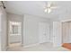 Bedroom with neutral walls and carpet features an adjacent bathroom at 11335 Wescott Hill Dr, Huntersville, NC 28078
