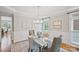 Bright dining room featuring a marble table, stylish chairs, and elegant decor at 11335 Wescott Hill Dr, Huntersville, NC 28078
