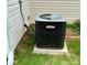 A close up view of a Lennox central air conditioner unit on the side of the house at 11511 Wilson Mill Ln, Pineville, NC 28134