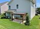 An inviting backyard with a pergola-covered patio, ideal for outdoor relaxation and entertaining at 11511 Wilson Mill Ln, Pineville, NC 28134
