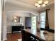 Inviting dining room with elegant decor, wood floors, and arched doorway at 11511 Wilson Mill Ln, Pineville, NC 28134