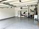Clean garage featuring ample storage and a spacious, well-lit area at 11511 Wilson Mill Ln, Pineville, NC 28134