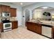 Kitchen with stainless steel appliances, granite countertops, tile backsplash, and open view to living room at 11511 Wilson Mill Ln, Pineville, NC 28134