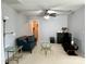 Upstairs living room with comfortable seating, ceiling fan, and carpeted floors at 11511 Wilson Mill Ln, Pineville, NC 28134