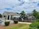 Community playground area with gated play equipment and a nearby pool house at 11511 Wilson Mill Ln, Pineville, NC 28134