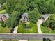 Aerial view of home with well-maintained lawn and landscaping in a lush, green neighborhood at 121 Canterbury Xing, Fort Mill, SC 29708