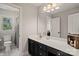 Bathroom featuring double sink vanity, white countertops, modern fixtures, and great natural lighting from the window at 121 Canterbury Xing, Fort Mill, SC 29708
