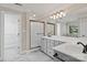 En-suite bathroom with double sinks, a glass shower, and decorative lights at 121 Canterbury Xing, Fort Mill, SC 29708