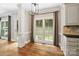 Cozy breakfast nook with bright windows and views of the landscaped backyard at 121 Canterbury Xing, Fort Mill, SC 29708