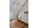 Bright foyer featuring hardwood floors, a staircase, and a decorative front door at 121 Canterbury Xing, Fort Mill, SC 29708