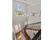 Bright foyer features staircase with natural light from large window at 121 Canterbury Xing, Fort Mill, SC 29708