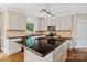 Stylish kitchen with granite countertops, white cabinets, and a large island at 121 Canterbury Xing, Fort Mill, SC 29708