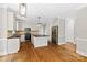 Bright kitchen featuring granite countertops, stainless steel appliances, and a center island at 121 Canterbury Xing, Fort Mill, SC 29708