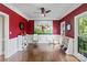 Cozy living room with hardwood floors, wainscoting, and large windows at 121 Canterbury Xing, Fort Mill, SC 29708
