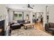Cozy living room features a fireplace, hardwood floors and natural light at 121 Canterbury Xing, Fort Mill, SC 29708