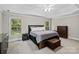 Spacious main bedroom featuring trey ceiling, carpet, and natural light at 121 Canterbury Xing, Fort Mill, SC 29708