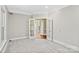 Well-lit office with neutral carpet, and double glass doors at 121 Canterbury Xing, Fort Mill, SC 29708