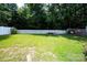 View of the fenced in backyard and features a cozy firepit area at 1288 Shenandoah Cir, Rock Hill, SC 29730