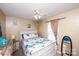 Relaxing bedroom with coastal decor, a ceiling fan, and soft lighting, creating a serene and inviting space at 1288 Shenandoah Cir, Rock Hill, SC 29730