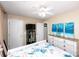 Bedroom with nautical bedding, ceiling fan, and ample storage, creating a cozy and functional living space at 1288 Shenandoah Cir, Rock Hill, SC 29730