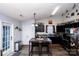 Well-lit kitchen features dark cabinetry, and an island bar top with seating for enjoying food and refreshments at 1288 Shenandoah Cir, Rock Hill, SC 29730