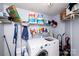 Functional laundry room with shelving, washer, and dryer, perfect for keeping things organized and tidy at 1288 Shenandoah Cir, Rock Hill, SC 29730