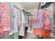 A well-organized closet filled with an assortment of clothing items at 1300 Reece Rd # 206, Charlotte, NC 28209