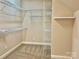 Walk-in closet with wire shelving and carpet at 1302 Devonmere Pl, Salisbury, NC 28144