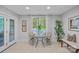 Bright dining area with views of the pool, perfect for enjoying casual meals or entertaining guests at 1317 Longleaf Ct, Matthews, NC 28104